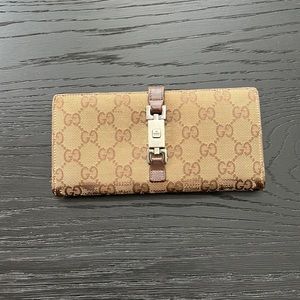 Gucci wallet.  Purchased a while back from Zaddy!!!
